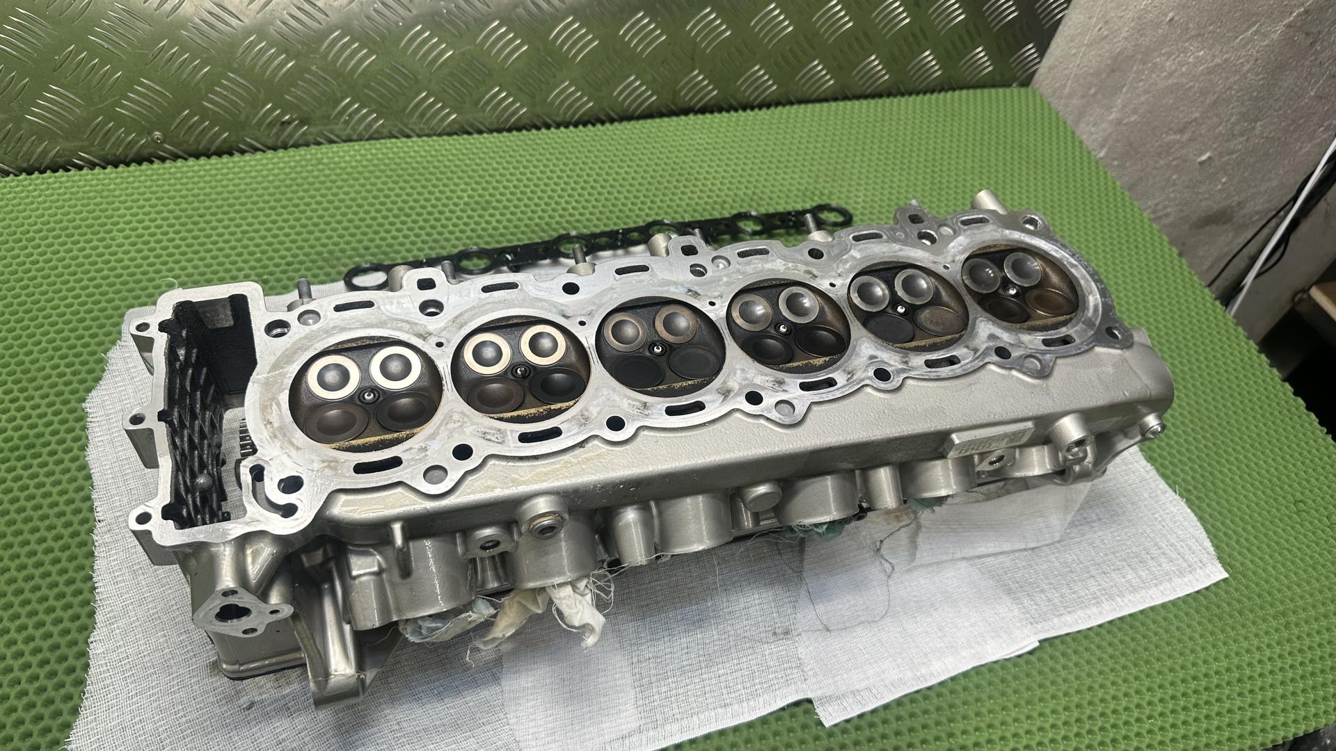 головка блока цилиндров 11118546019